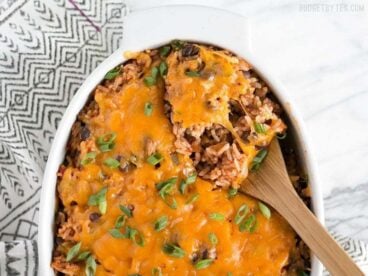 This Beef Burrito Casserole is totally customizable and can include all your favorite burrito or nacho toppings. Leftovers reheat great for lunch! Budgetbytes.com