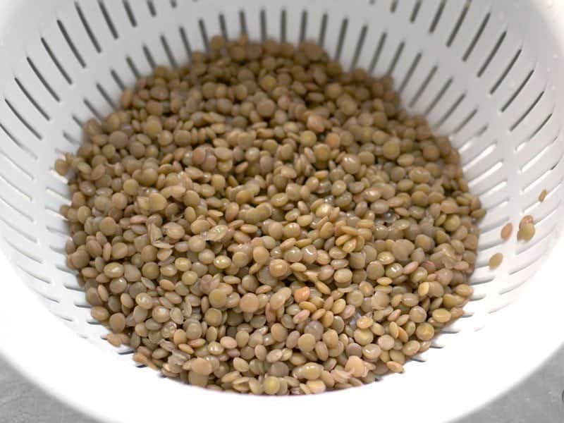 Cooked Lentils and drained lentils in a colander