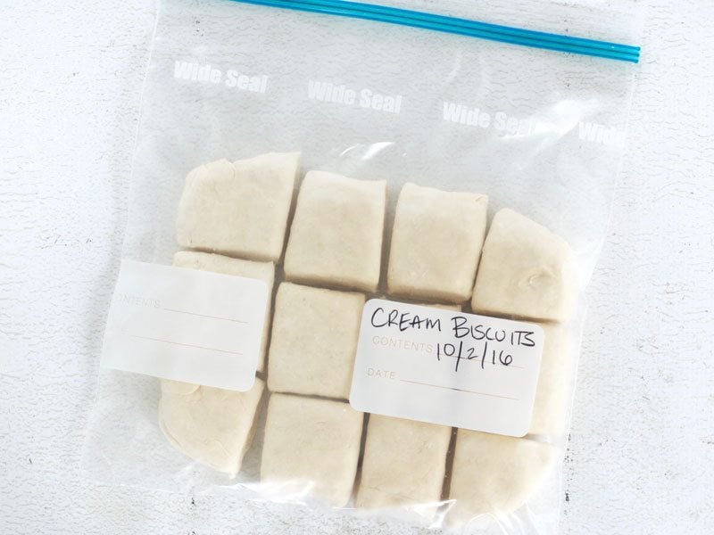 Frozen biscuit dough in a labeled freezer bag