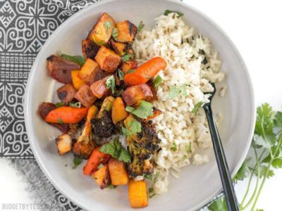 Harissa Roasted Vegetables are a spicy, slightly sweet, and smoky vegetable medley that makes a great side for meat or fish. BudgetBytes.com