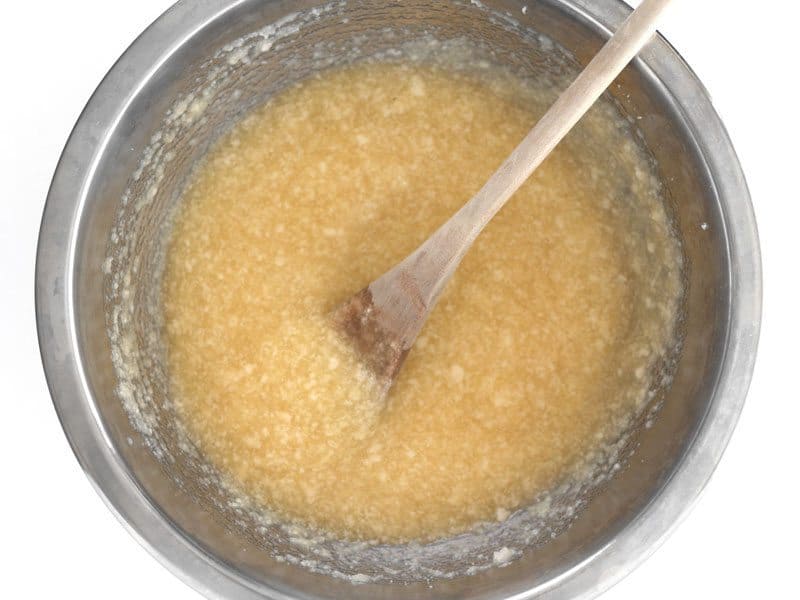 Stir Applesauce into butter and sugar mixture