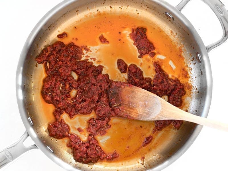 Tomato Paste and Sugar added to the skillet