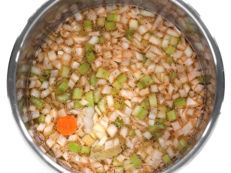 Vegetable broth added to pressure cooker