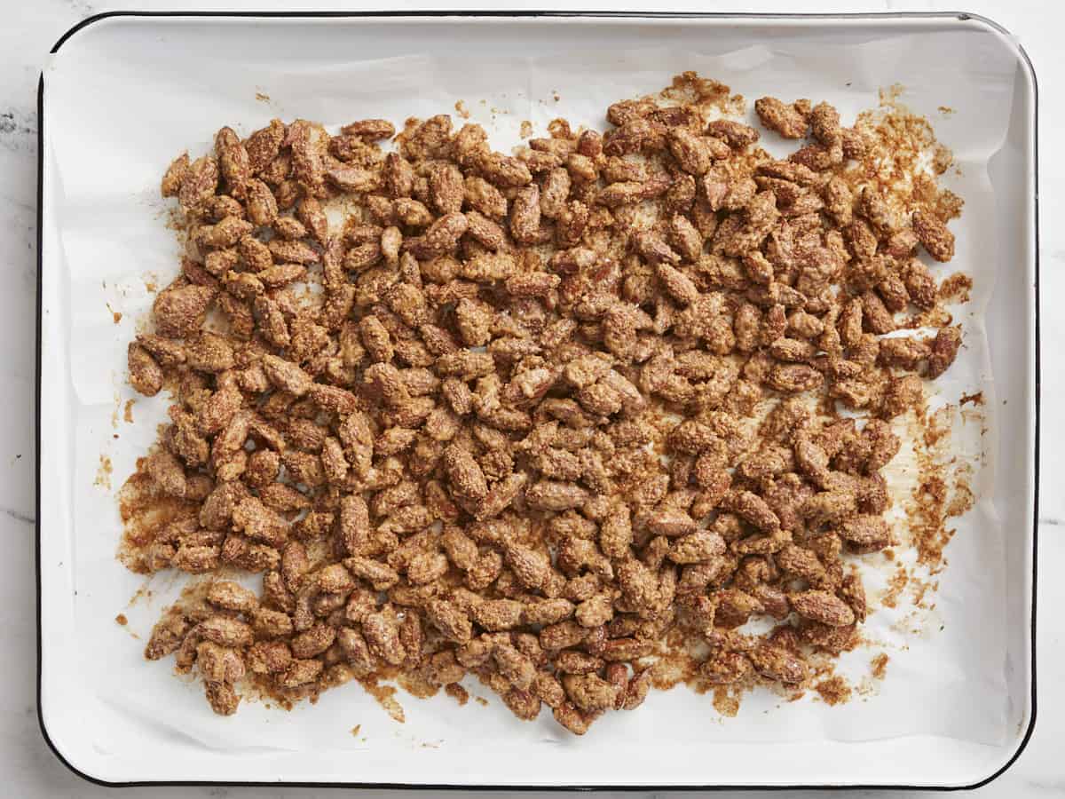 Baked candied almonds on the baking sheet. 