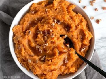 Maple Brown Butter Mashed Sweet Potatoes are a simple way to add a little something extra special to your Thanksgiving table. BudgetBytes.com