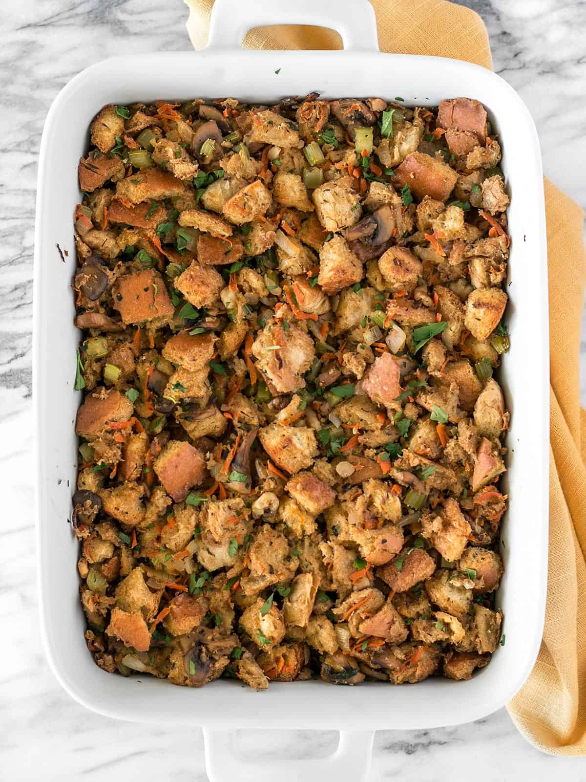 Overhead view of a casserole dish full of vegetarian stuffing.