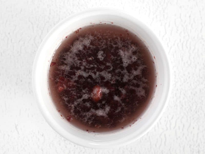 Soak Cranberries in hot water