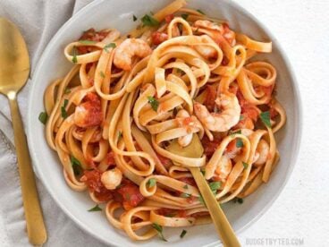 Spicy Seafood Pasta with Tomato Butter Sauce is a simple go-to weeknight dinner that can be made with pantry staples. BudgetBytes.com