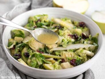 This Warm Brussels Sprouts and Pear Salad combines winter flavors in a warm and filling side dish. BudgetBytes.com