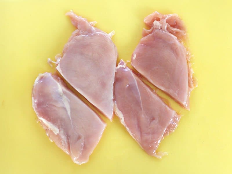 Cut Chicken Breasts in half to make four portions