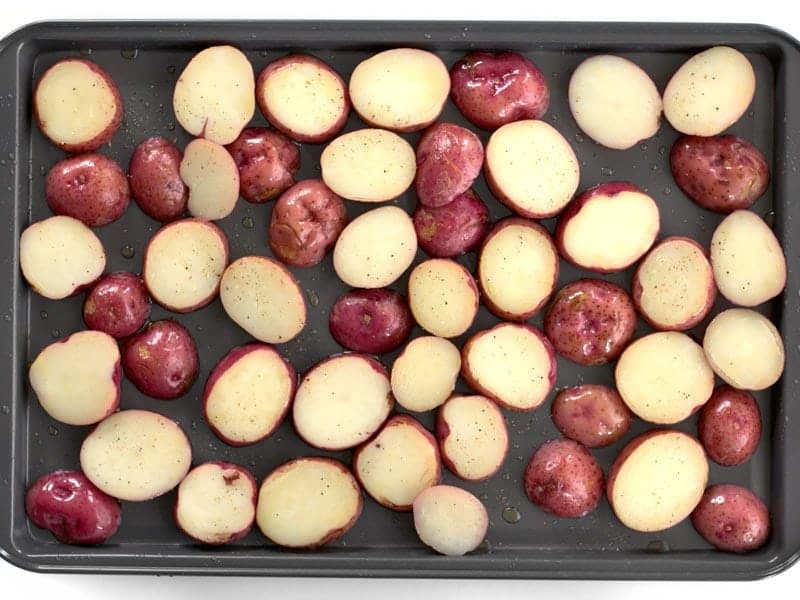 Cut Potatoes on baking sheet Ready to Roast