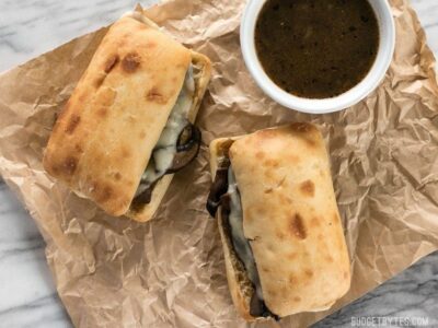 These Vegetarian French Dip Sandwiches are fast, easy, and feature a salty-sweet herb infused vegetarian au jus for dipping. BudgetBytes.com