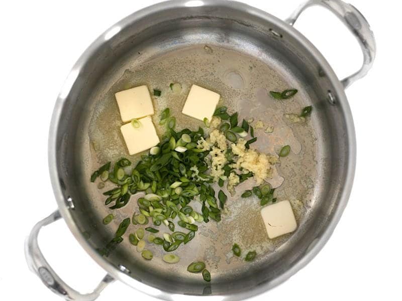 Butter Garlic and Green Onions in the stock pot
