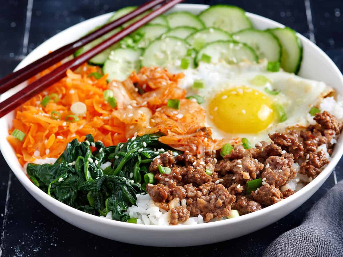 Side view of a bibimbap bowl.