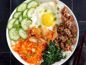 Overhead view of a bibimbap bowl meal.