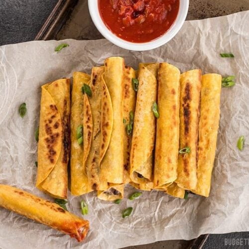 Creamy Black Bean Taquitos are an easy and tasty party treat for football games or just for fun! BudgetBytes.com