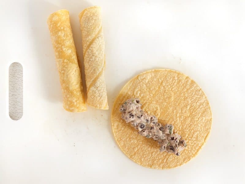 Fill Tortillas and roll into a cigar shape