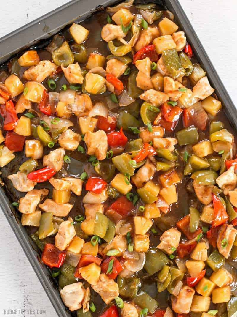 This oven baked Sheet Pan Sweet and Sour Chicken is a little more forgiving than a fast moving, high heat stir fry, making it great for beginners! BudgetBytes.com