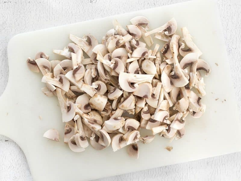 Sliced Mushrooms on a cutting board