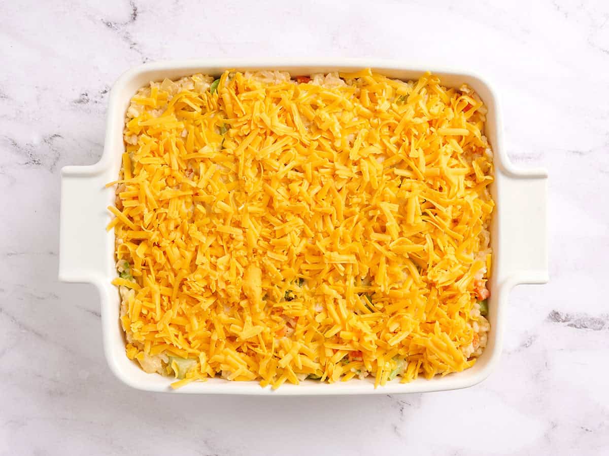 Chicken and rice casserole in a casserole dish before baking