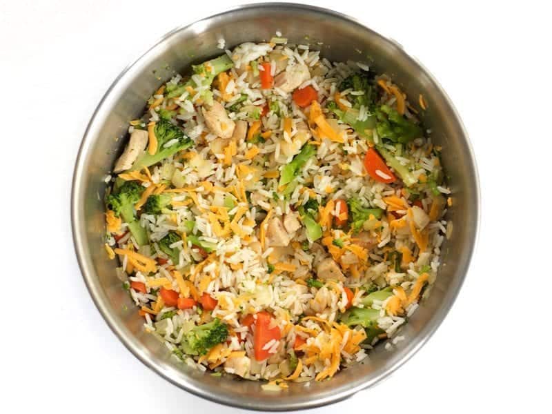 Stir Cheese into rice and vegetable mixture