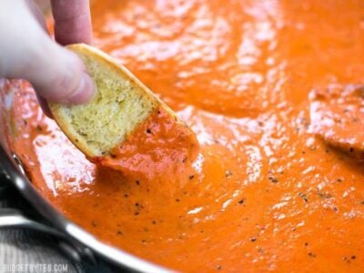 Creamy Roasted Red Pepper Sauce is a great alternative to tomato based sauces for pasta, pizzas, or just for dipping your favorite crusty bread. BudgetBytes.com