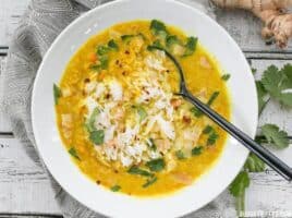 Golden Coconut Lentil Soup is a light and fresh bowl with vibrant turmeric and a handful of fun toppings. BudgetBytes.com