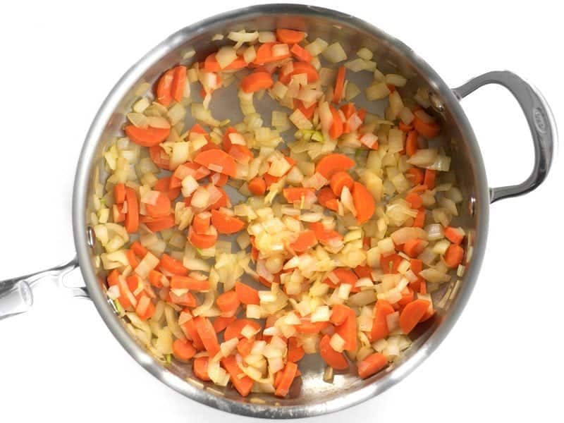 Add Onion and Carrots to the skillet and saute