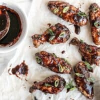 These crispy Raspberry Balsamic Baked Chicken Wings are baked, not fried, and slathered in a sweet, tangy, and rich homemade sauce. BudgetBytes.com