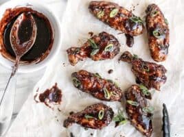 These crispy Raspberry Balsamic Baked Chicken Wings are baked, not fried, and slathered in a sweet, tangy, and rich homemade sauce. BudgetBytes.com