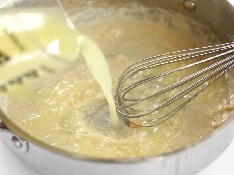 Whisk in Broth into roux in the skillet