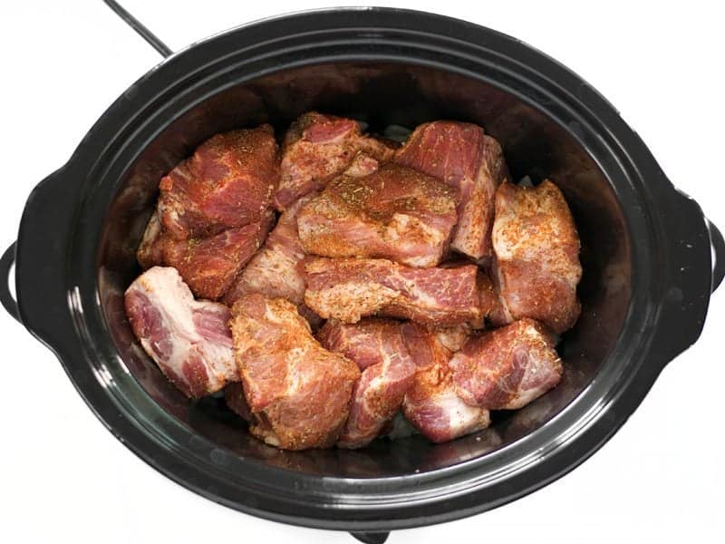 Add Seasoned Pork chunks to the slow cooker