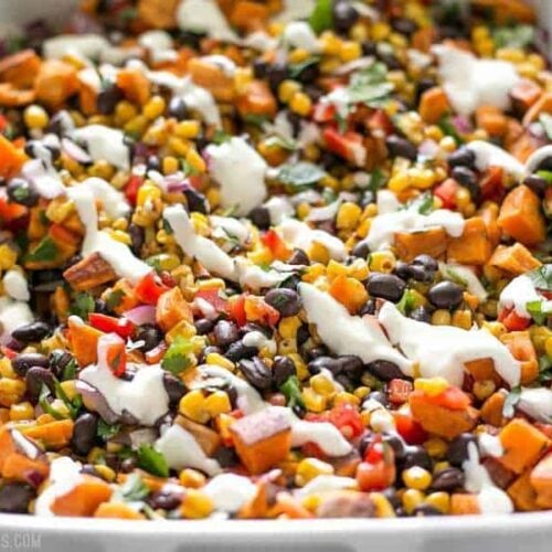 This Roasted Sweet Potato Rainbow Salad combines a medley of vibrant colors and flavors, brought together by a bright and creamy dressing. BudgetBytes.com