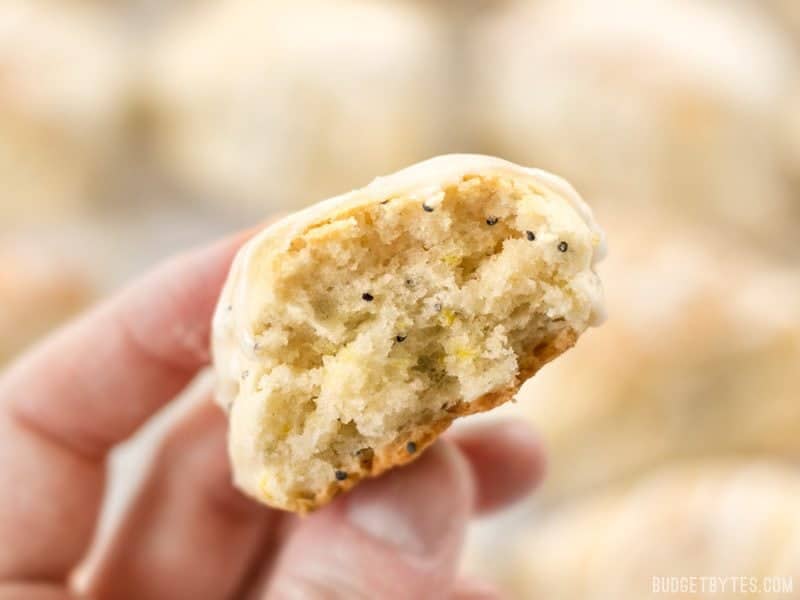 Close up of the inside of one lemon poppy seed two-bite scone