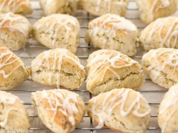 These cute little lemon poppy seed two-bite scones are soft and sweet with a deliciously tart lemon glaze. You won't be able to have just one! BudgetBytes.com
