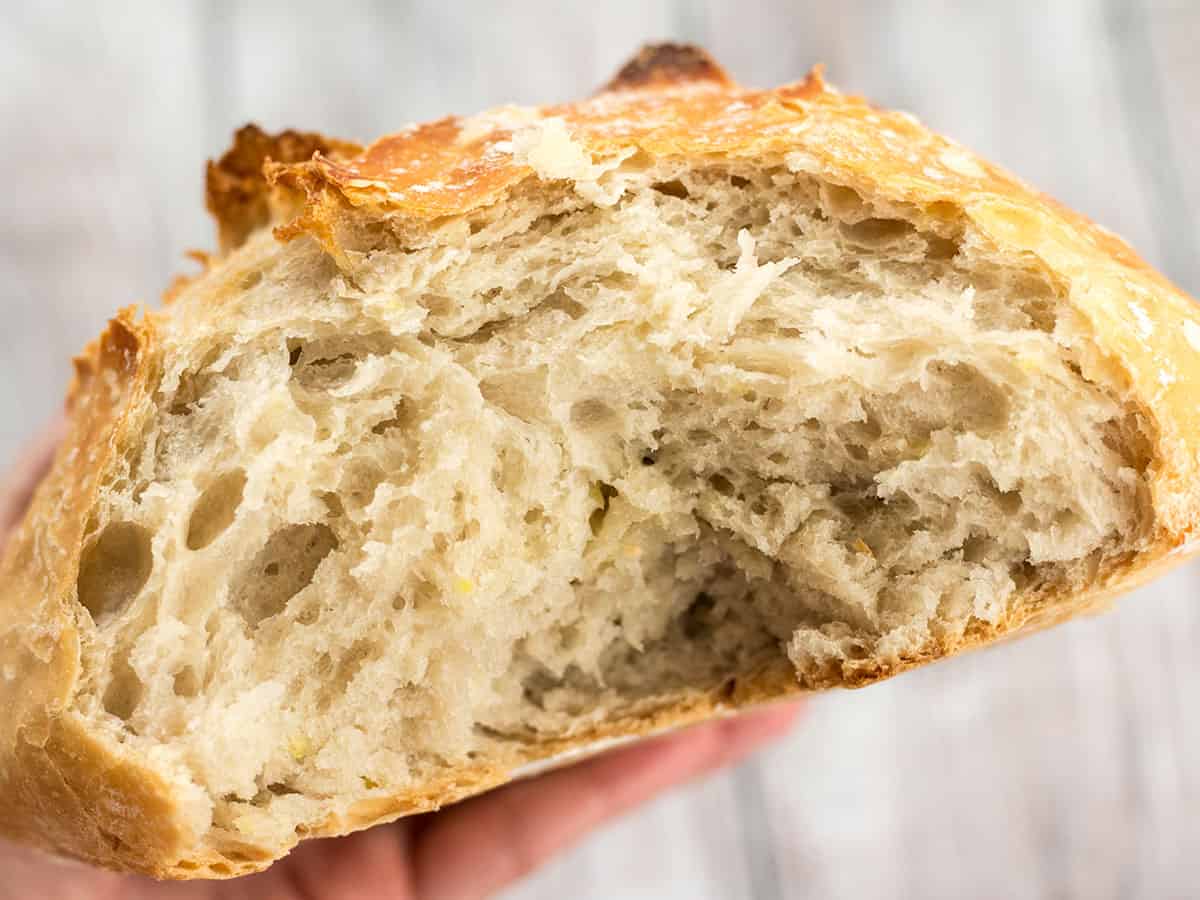 Close up view of the inside of a loaf of no-knead bread.