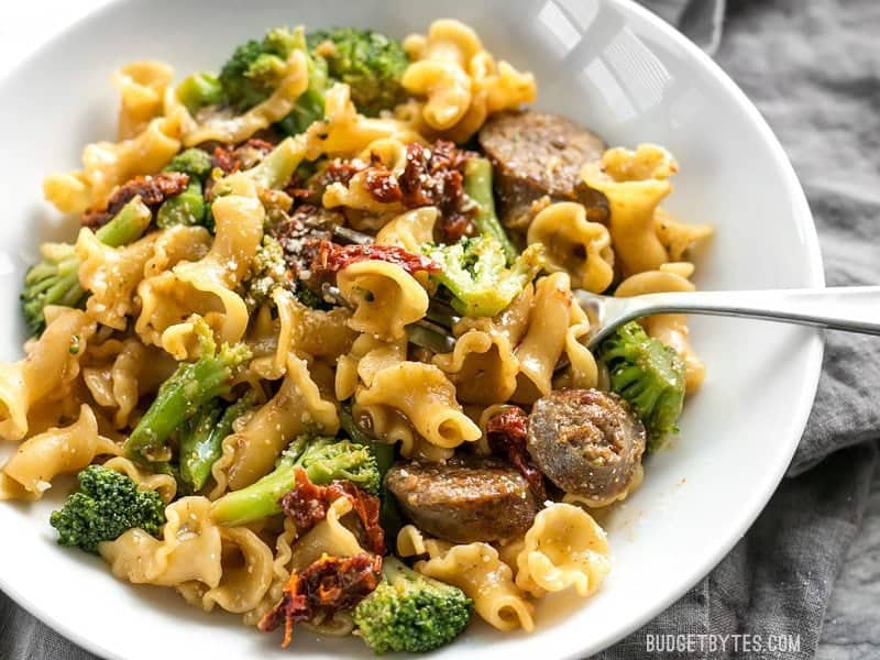 This One Pot Sausage and Sun Dried Tomato Pasta cooks quickly and in one skillet so that no flavor is lost! Make dinner fast, easy, and delicious. BudgetBytes.com