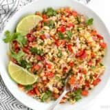 Riced cauliflower makes a filling low-carb base for this fresh and vibrant Thai-inspired Peanut Lime Cauliflower Salad. BudgetBytes.com