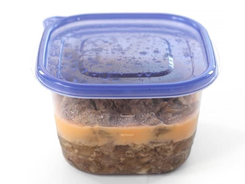 Refrigerated Carnitas in a reusable food storage container
