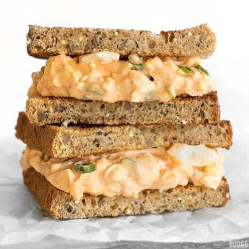 Sriracha Egg Salad is a simple yet satisfying dish that boasts a creamy, tangy, and spicy sauce. BudgetBytes.com
