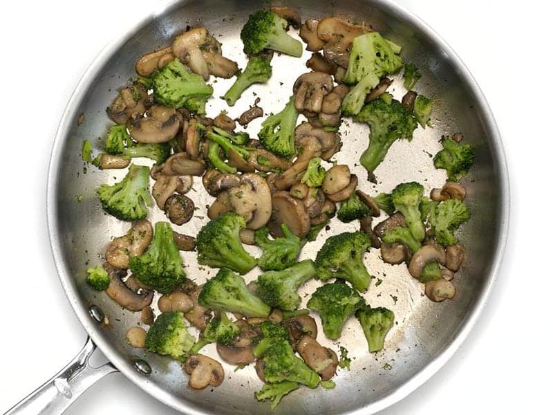 Add Frozen Broccoli Florets to skillet with mushrooms