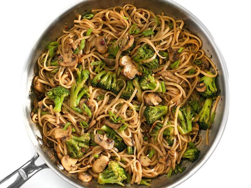 Finished Mushroom Broccoli Stir Fry Noodles in a large skillet