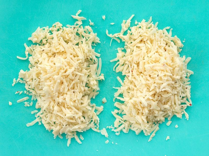 Shredded Pepper Jack divided into two portions