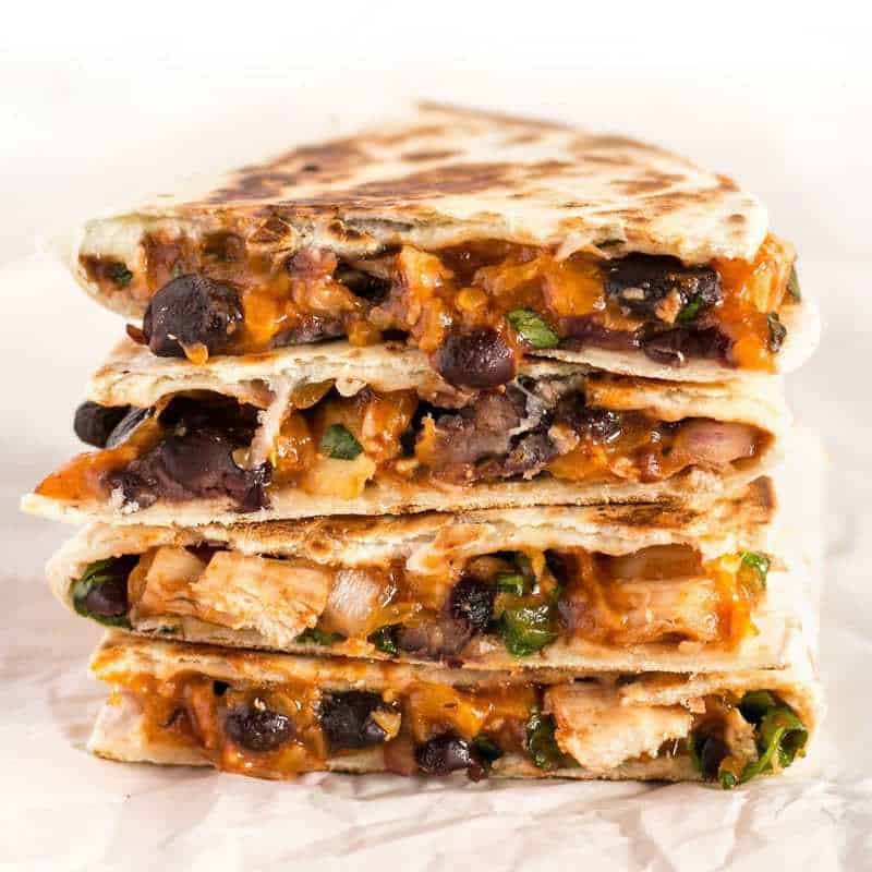 A stack of Ultimate BBQ Chicken Quesadillas open sides facing camera