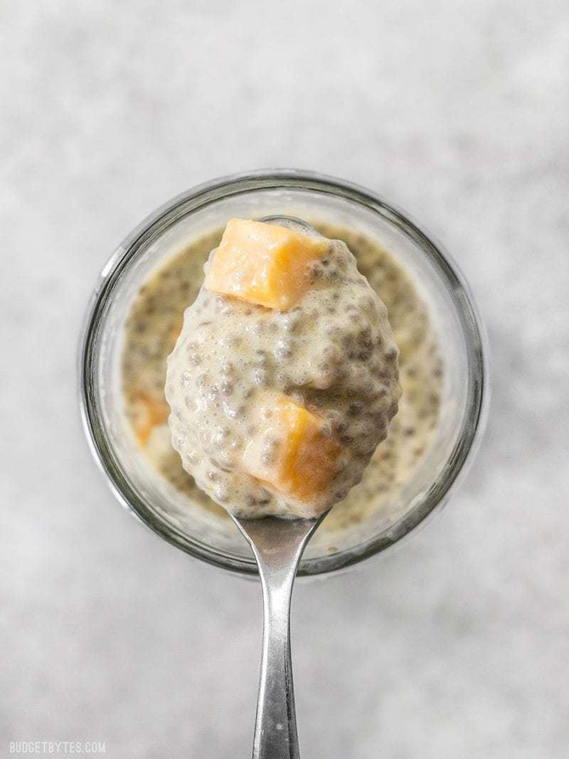 Close up of a spoonful of Mango Coconut Chia Pudding