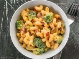 This One Pot Bacon Broccoli Mac and Cheese is fast, easy, and absolutely fool proof. This sauce stays smooth and creamy! BudgetBytes.com