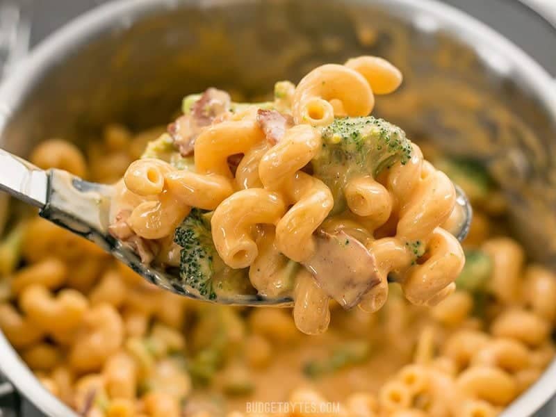 Close up of a spoonful of Bacon Broccoli Mac and Cheese