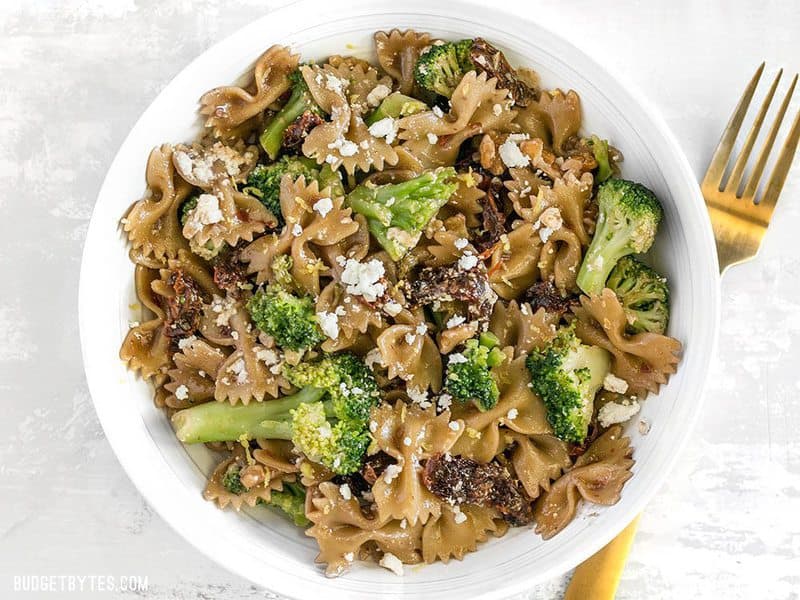 A bowl of Skillet Pasta with Sun Dried Tomatoes Walnuts and Feta