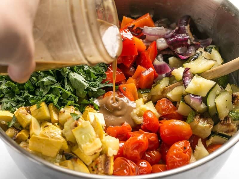 Add Vinaigrette to chopped vegetables