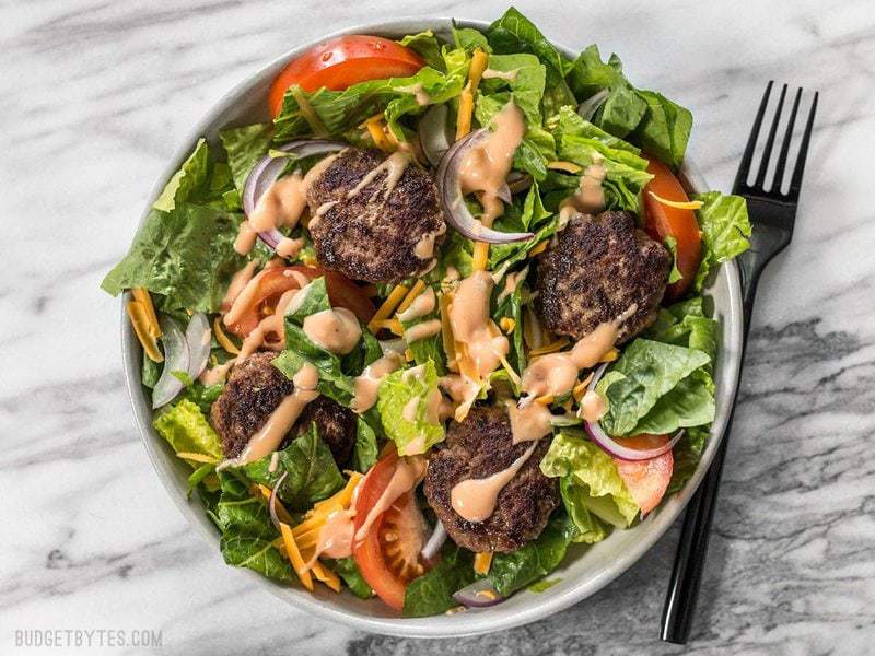 Cheeseburger salad ready to eat in a bowl